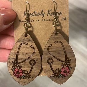 Earrings with stethoscope/flower design
